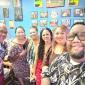 Haylie-Jeanette Tuiaoopo, center with office staff