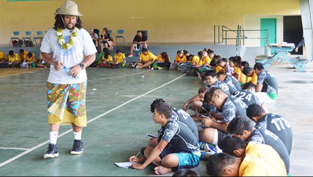 A member of the team, headed by Jeremiah Masoli, speaking Monday morning to students, during the athletics clinic at Leone High School, which was the last public high school, visited by the team, during their one week on island. The San Francisco-based non-profit group CASEProject teamed up with Masoli, whose parents are from American Samoa, to set up literacy workshops — called “Samoan Voice” — and football clinics throughout last week, including a “football combine and skills clinic,” held last Saturday. 