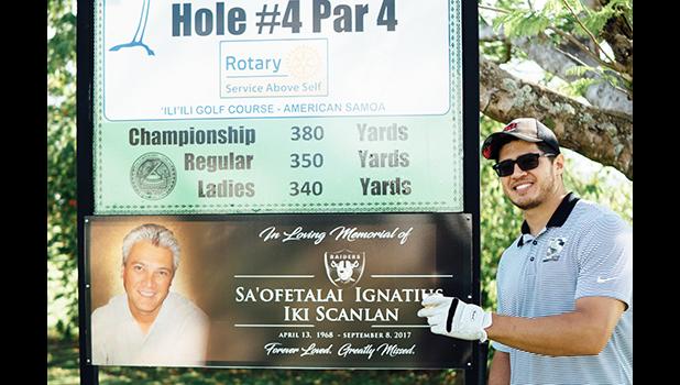 Toa Scanlan in front of his late father Iki's hole #4 sign