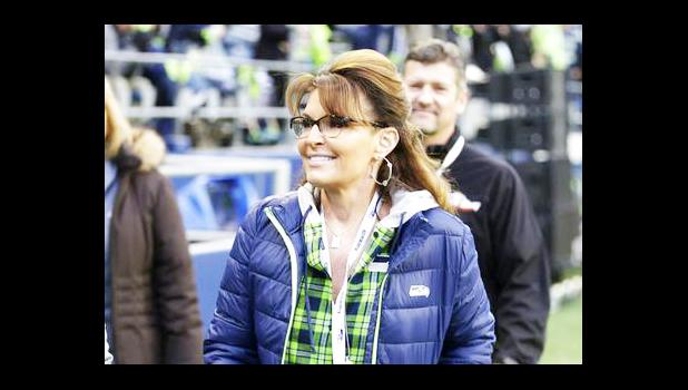 In a Thursday, Dec. 15, 2016 file photo, Sarah Palin, political commentator and former governor of Alaska, walks on the sideline before an NFL football game between the Seattle Seahawks and the Los Angeles Rams, in Seattle. Palin's spokesman told The Associated Press on May 11, 2017, that reports that she was in a coma following a car accident are not true. (AP Photo/Scott Eklund, File) In a Thursday, Dec. 15, 2016 file photo, Sarah Palin, political commentator and former governor of Alaska, walks on the sideline before an NFL football game between the Seattle Seahawks and the Los Angeles Rams, in Seattle. Palin's spokesman told The Associated Press on May 11, 2017, that reports that she was in a coma following a car accident are not true. (AP Photo/Scott Eklund, File)