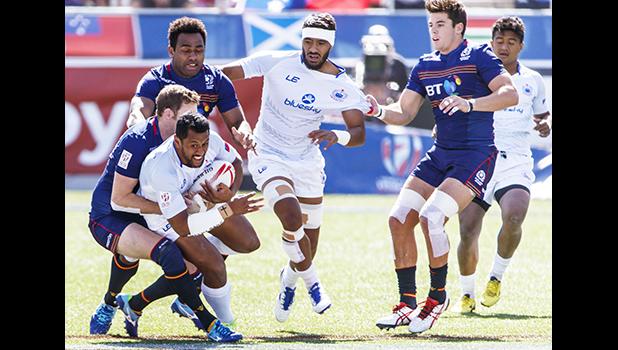 Neria Fomai #6 of Samoa tackled by Scotland defenders during the Trophy Semi Final match between Samoa and Scotland at the HSBC Rugby Sevens Series held in Sam Boyd Stadium March 3-5, 2017. Final score:  Scotland-0, Samoa- 24. (Photo by Allan Hamilton/ Calibre Sports Photomedia)