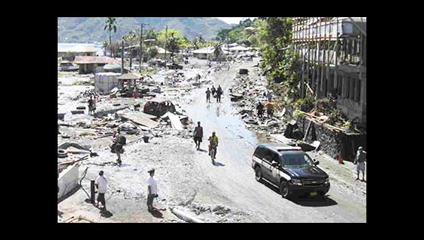 Aftermath of the 2009 Tsunami in the village of Pago Pago that hit American Samoa as well as neighboring Samoa, causing many deaths. At the time of the disaster, American Samoa’s tsunami warning system was still on the drawing board.  [SN file photo]