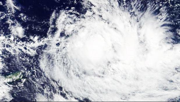  NASA's Terra satellite passed over Ella on May 9 at 2210 UTC and saw a somewhat elongated center of circulation located west of American Samoa. A band of thunderstorms east of the center were affecting the U.S. territory. Credit: NASA Goddard MODIS Rapid Response  [photo: via Phys.org]