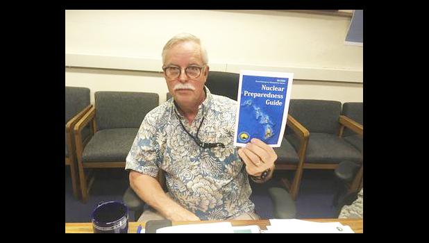 Toby Clairmont, the Hawaii Emergency Management Agency's executive officer, shows new informational materials to a reporter in Honolulu on Friday, July 21, 2017. Hawaii announced a new public education campaign to prepare for the possibility of a ballistic missile strike from North Korea. (AP Photo/Jennifer Sinco Kelleher) Toby Clairmont, the Hawaii Emergency Management Agency's executive officer, shows new informational materials to a reporter in Honolulu on Friday, July 21, 2017. Hawaii announced a new public education campaign to prepare for the possibility of a ballistic missile strike from North Korea. (AP Photo/Jennifer Sinco Kelleher)