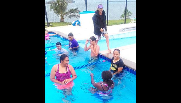 PHS's high school swimming class with instructor, Debbs Cox