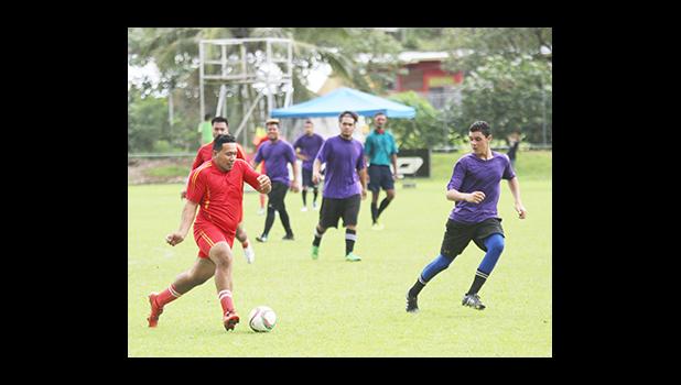 Eric Felise, left, of Black Roses in action against PanSa’s Jacob Scanlan in a men’s game on Match Day 5 of the 2016 FFAS National League on Saturday, Sept. 17, 2016 at Pago Park Soccer Stadium.  [FFAS MEDIA/Brian Vitolio] 