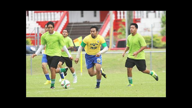 Peter Alosio (middle) of the Tafuna Jets dribbles against Lion Heart defenders Paul Collins (left) and Frank Hunt (right) in a men’s game on Match Day 5 of the 2016 FFAS National League on Saturday, Sept. 17, 2016 at Pago Park Soccer Stadium.  [FFAS MEDIA/Brian Vitolio] 