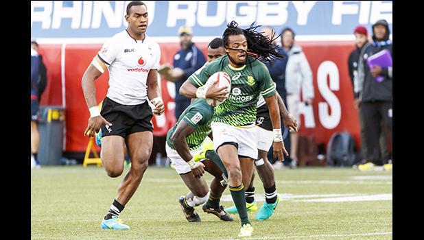 Cecil Afrika #10 of South Africa scores during the Cup Final match between South Africa and Fiji at the HSBC Rugby Sevens Series held in Sam Boyd Stadium March 3-5, 2017. Final score:  South Africa-19, Fiji-12. (Photo by Allan Hamilton/ Calibre Sports Photomedia)