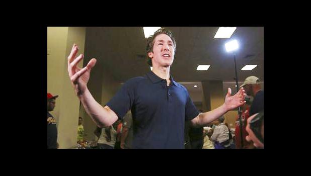 Pastor Joel Osteen gives an interview at his Lakewood Church in Houston, Texas, Tuesday, Aug. 29, 2017. Osteen and his congregation have set up their church as a shelter for evacuees from the flooding by Tropical Storm Harvey. (AP Photo/LM Otero)