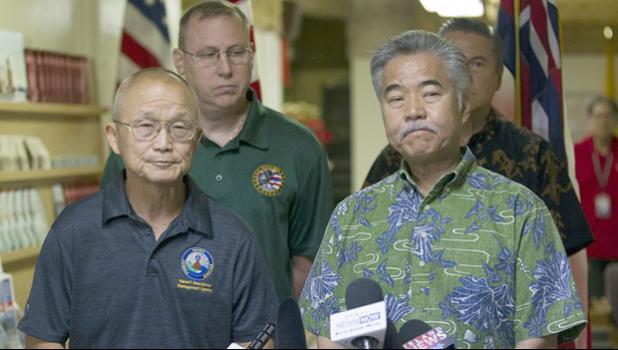 Vern Miyagi, Administrator, HEMA, left, and Hawaii Gov. David Ige addressed the media Saturday, Jan. 13, 2018, during a press conference at the Hawaii Emergency Management Center at Diamond Head Saturday following the false alarm issued of a missile launch on Hawaii. A push alert that warned of an incoming ballistic missile to Hawaii and sent residents into a full-blown panic was a mistake, state emergency officials said. (George F. Lee /The Star-Advertiser via AP) 