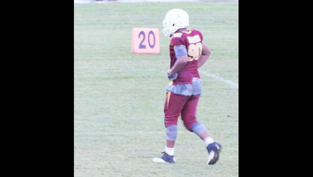 Last Wednesday night the Division 2 (5th and 6th graders) JPS Warrior #90 Francis Mauigoa walks away after he took the ball 60 yards for the first and only touchdown of the game against the JPS Vikings, which leads their team to the Championship this Saturday. [photo:EM]