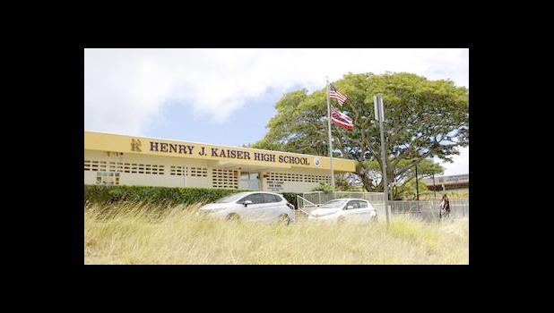 This Tuesday, July 11, 2017 photo shows the front office of Kaiser High School in Honolulu. Army Sgt. 1st Class Ikaika Kang graduated from the school in 2001. Those who know him said they're shocked to hear about terrorism charges against him after authorities said he pledged allegiance to the Islamic State group. (AP Photo/Jennifer Sinco Kelleher) This Tuesday, July 11, 2017 photo shows the front office of Kaiser High School in Honolulu. Army Sgt. 1st Class Ikaika Kang graduated from the school in 2001. Those who know him said they're shocked to hear about terrorism charges against him after authorities said he pledged allegiance to the Islamic State group. (AP Photo/Jennifer Sinco Kelleher)