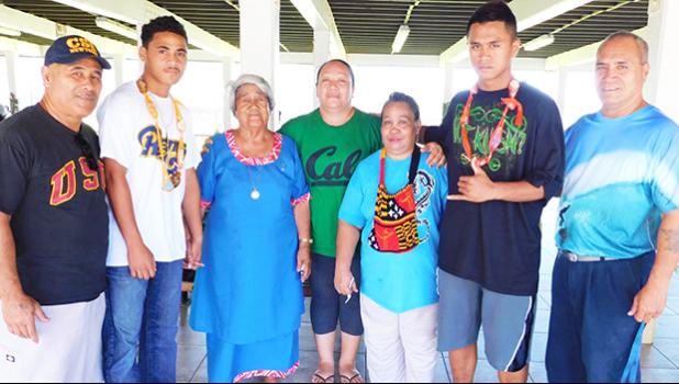 In this photo are the two young boxers at the airport with their families this past Monday as they prepared to leave for their training camp.  [Photo: EM]