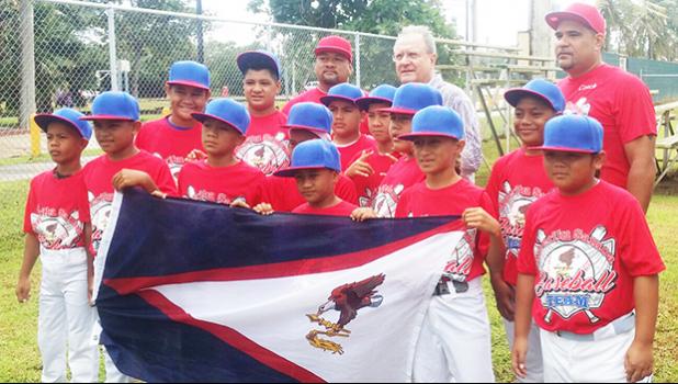 AS Baseball team with their Head Coach Leaupepe Vili Fa’apouli, Assistant Coach Marcus Langkilde and the President of the World Baseball and Softball, Mr. Riccardo Fraccari before their match against their opponent from Australia. There are 12 players, led by Head Coach Leaupepetele Vili Fa'apouli and Assistant Coach Marcus Langkilde.  [courtesy photo]