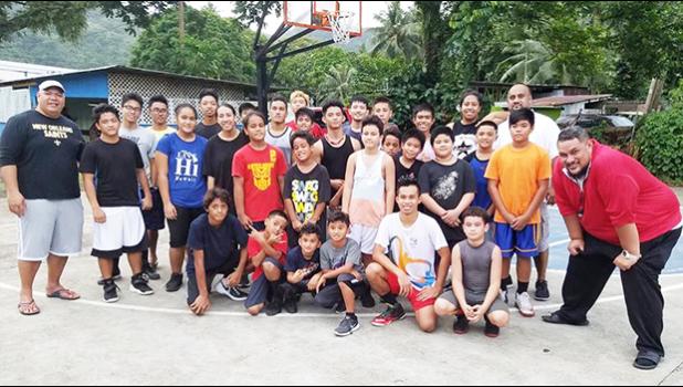 Aspiring basketball players participating in the ongoing ASBA summer clinic for the Central District, pictured with their coaches Diehl Langkilde and Milton Taufaasau. See story for full details.   [photo: Mark Espiritu]