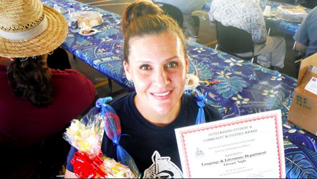 ASCC Language & Literature chairperson Mrs. Mele Fiaui is seen here with the award presented to her department during the College's Faculty Achievement Awards Ceremony last week.  [Photo: J. Kneubuhl]