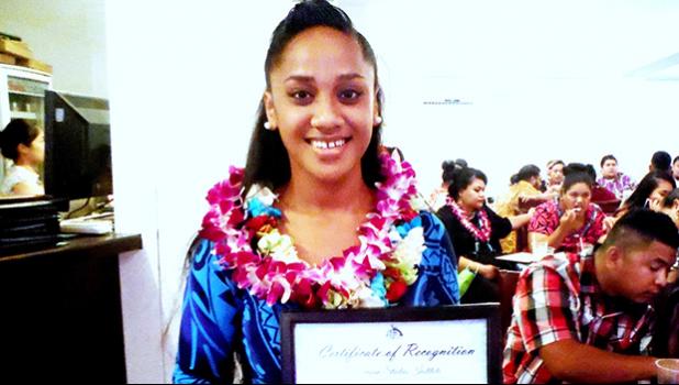 Spring 2017 ASCC graduate Salome L. Saili displays her award from the Samoan Studies Department during the Graduate Banquet held last week. The event recognizes academic achievement and leadership in the diverse areas of study offered at ASCC.  [Photo: J. Kneubuhl]