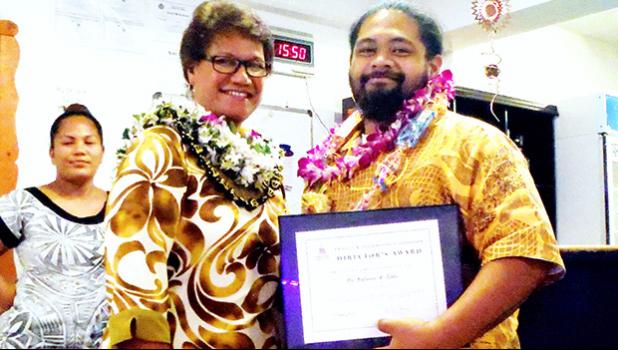ASCC Vice President of Academic and Student Affairs Dr. Lina Galea'i-Scanlan (left) presents spring 2017 graduate Nafanua R. Tialu with the semester's Trades & Technology Award during the Graduate Banquet held last week. The event recognizes academic achievement and leadership in the diverse areas of study offered at ASCC.  [Photo: J. Kneubuhl]