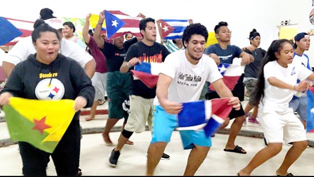 Cast members of the ASCC 2017 theatrical production “In The Heights” rehearse the Carnaval De Barrio scene. The play, set in the Dominican-American neighborhood of Washington Heights in New York City, will take place this coming Tuesday and Wednesday, May 2 and 3, in the Gov. H. Rex Lee Auditorium. Doors open at 6 p.m. and the show gets underway at 7:30. See story inside. [Photo: K. Tuiasosopo]