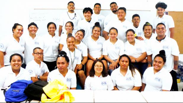 New and existing members of the ASCC Alpha Epsilon Mu chapter of the Phi Theta Kappa (PTK) honor society gather with their advisor Mr. Kuki Tuiasosopo (2nd row, far right). The PTK held their spring 2017 induction ceremony last week.  [Photo: J. Kneubuhl]