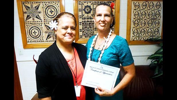 Local artist Regina Meredith-Fitiao of the ASCC Fine Arts Department with ASCC President Dr. Rosevonne Makaiwi Pato. Meredith recently wrote an article on the dyes used for Samoan siapo, which has been published in Turkey Red Journal, an online resource for practitioners all over the world who work with making dyes and applying them. (Photo: J. Kneubuhl) Local artist Regina Meredith-Fitiao of the ASCC Fine Arts Department with ASCC President Dr. Rosevonne Makaiwi Pato. Meredith recently wrote an article on the dyes used for Samoan siapo, which has been published in Turkey Red Journal, an online resource for practitioners all over the world who work with making dyes and applying them. (Photo: J. Kneubuhl)