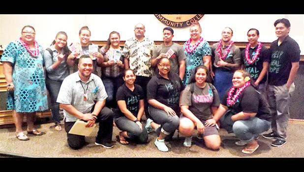 Members of the ASCC Health & Human Services Club, including advisor Derek Helsham (front, far left) are seen here with the guest speakers at last week's Sexual Assault Awareness Forum. Speakers included Mrs. Judy Mata'utia and Mrs. Mona Uli from the Alliance Against Domestic and Sexual Violence, Dr. Peni Biukoto of the DOH Behaviorial Health Clinic, and Mr. Ioana Vaimaona, a certified self-defense martial arts instructor.  [Photo: J. Kneubuhl]