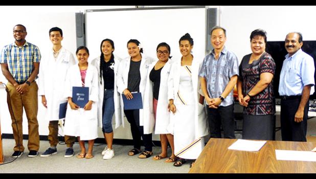 Local high school students and attendees of the 9th Annual STEP-UP High School Summer Research Symposium held at the Agriculture, Community and Natural Resources (ACNR) Division of the American Samoa Community College (ASCC) on July 22, 2017.  (L to R) Dr. Rob Rivers, Athanasius Talataina, Olyvia Ta′ase, Joelyn G. Rafil, Karallyn Fitisone, Finiana Finau, Tausala Judy Leota, Dr. George Hui, Netini Sene and Dr. Joserose Jyothibhavan.  [Photo: ASCC-ACNR]