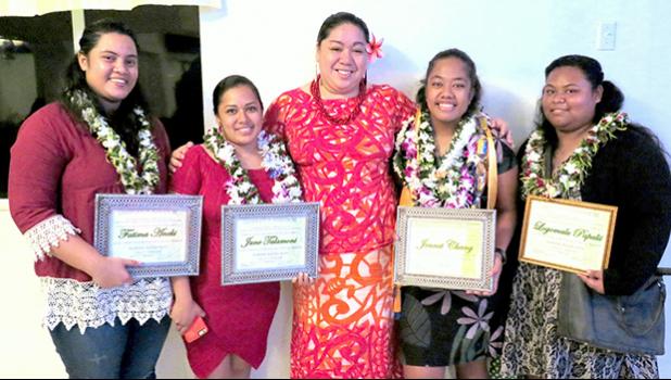 ASCC Agriculture, Community and Natural Resources (ACNR)/Land Grant Instruction Coordinator Mrs. Pauline Tuitele-McFall (center) celebrates alongside four recent ASCC graduates who will participate in various ACNR-organized internships this summer. Left-to-right: Fatima Aneki, June Talamoni, Tuitele-McFall, Jennet Chang and Logomalu Papalii.  [Photo: Katrina Garcia-Helsham]