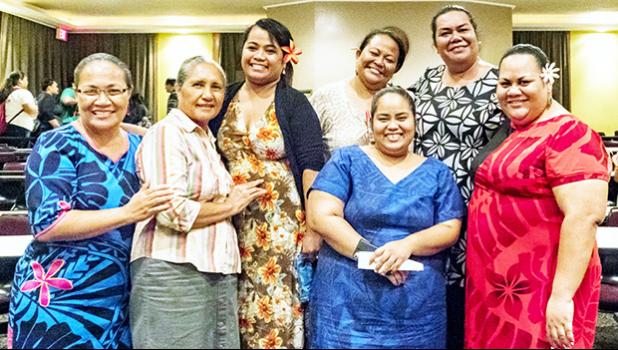 ASCC faculty, staff and students congratulate Samoan Studies Institute Director Okenaisa Fauolo-Manila (back, far right) following her campus lecture last week on Siva Samoa (Samoan dance).  [Photo: V. Tofilau]