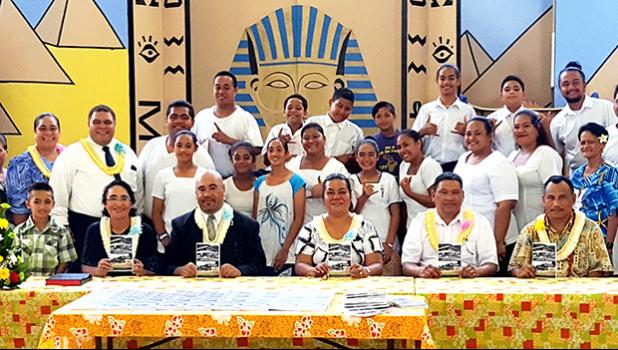 ASCC Samoan Studies Institue (SSI) Director Keseta Okenaisa Fauolo-Manila (center) is seen here with CCCAS Fagatogo Rev. Iasepi D. Ulu (to her immediate left), CCCAS Youth and SSI staff celebrating the launch of a new publication titles "O Lo'u Nuu o Fagatogo" or "Fagatogo, My Village," a collaboration between the CCCAS and the SSI.  [Courtesy Photo]