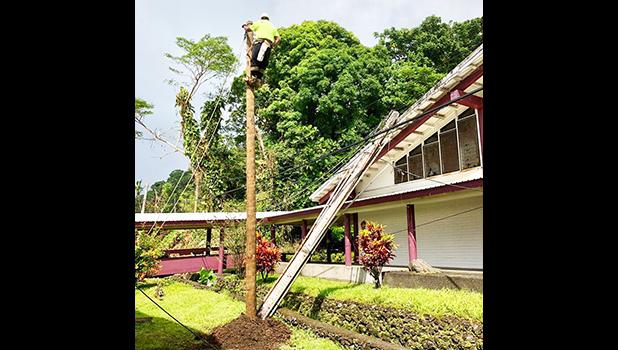 ASPA replaces a power pole at ASCC this past Saturday. [courtesy photo]