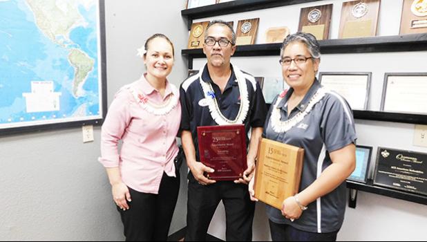 CEO of Neil’s ACE Home Center, Ngaire Ho Ching with two recipients recognized yesterday morning, in a special ceremony, for their long years of service — Teni Ma’ae worked for 25 years and Nadine Solofa-Taufa’asau for 15 years. [Photo: EM]
