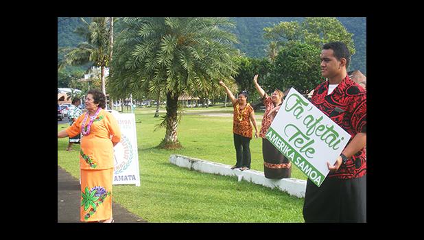 Congresswoman Aumua Amata (left) and her American Samoa staff this morning along the main highway in Utulei waving to motorist and thanking residents for re-electing her to a second term in office. [photo: Fili Sagapolutele]