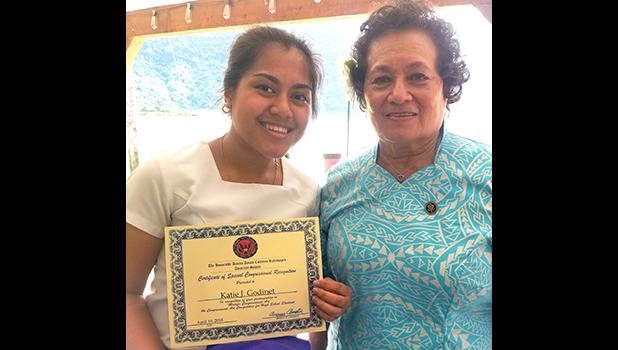 Congresswoman Aumua Amata with this year's Malofie Congressional Art Competition winner, Samoana High School's Katie Godinet.  [photo: courtesy]