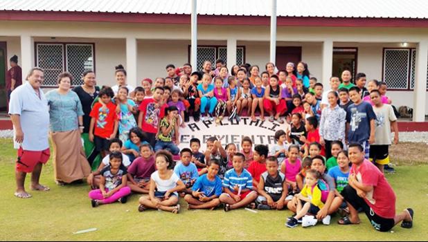 Amata with students at A.P. Lutali Elementary School. [courtesy photo]