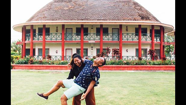 Ammon Fepuleai, Math teacher of Samoana High School with one of his students, Gabby Fauiaso Class of 2010, working together for a wedding photoshoot late last year in Apia, Samoa. [photo courtesy]