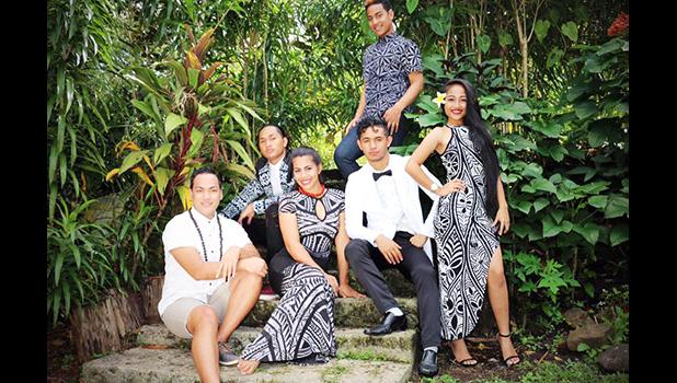 Ammon Fepuleai, Math teacher at Samoana High School – during a photoshoot with some of his talented students who worked with him, and graduated — Class of 2016.  See story below. [courtesy photo]