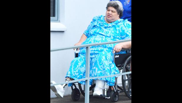 Angela Langkilde outside of the District Court yesterday morning. She stands accused of defrauding the Workmen's Compensation of a little over $100,000. [photo: AF]