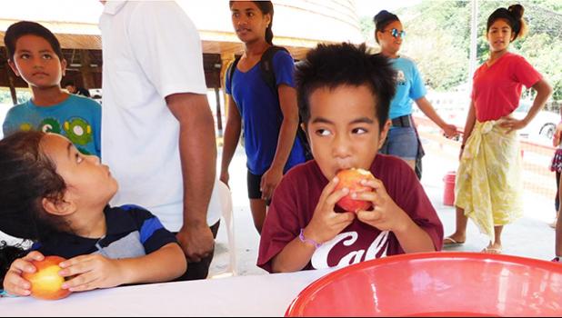 The Apple Eating Competition was one of the many games enjoyed by children — young & younger — who came to the 2nd Annual MASI Easter Bash at le Suigaula a le Atuvasa in Utulei, last Saturday. [Photo: EM] 