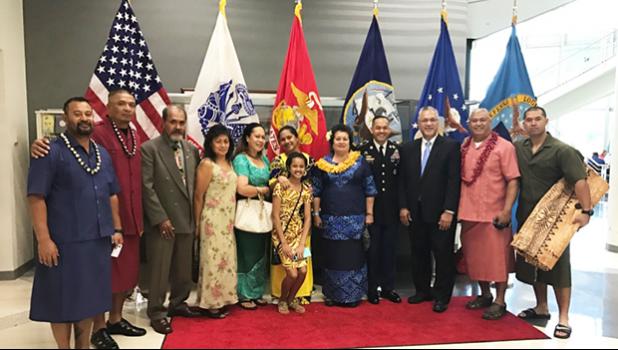 From L-R: Paulo Momoisea from Amaluia, SFC (USA Ret.) Robert Tua from Aasu, CSM (USA Ret.) and Mrs. Ioakimo Falaniko from Utulei, Mrs. Robert Tua, Vasa Loa and daughter Marilyn from Asili, Rep. Aumua Amata, CSM Charles M. Tobin, Acting DOI Assistant Secretary Nikolao Pula, SFC (USA Ret.) Fa’aaliga Matagi from Ta’u, 1SG Junior Galoia  [Courtesy photo]