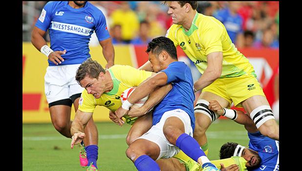 Australia discipline and intensity supplied their victory over Manu Samoa — Singapore Sevens, Day 1, National Stadium, Singapore.   [Photo: Barry Markowitz]