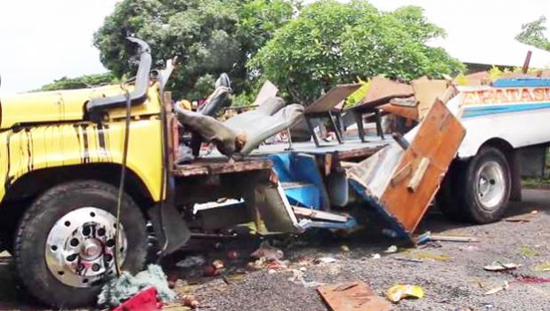 Footage of the incident's aftermath shows the bus crashed on the roadside without a roof and sides, and its seats badly damaged. [photo: Samoa Observer via MSN.com]