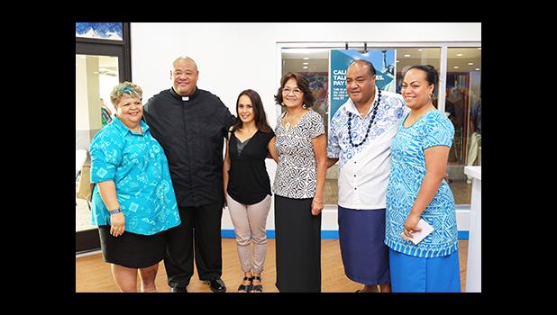 Bluesky Communications Country Manager of American Samoa Filifotu Va'ai-Tinitali (far right) posing with some of her colleagues, as well as Father Vaiula Kolio – just after the dedication ceremony of Bluesky Communications’ newly renovated store, inside the Laufou Shopping Center, yesterday morning. [photo: TG]