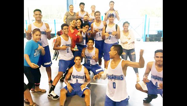 Samoana Sharks JV Boys Basketball team, their head coach, families and friends, who supported them after they won against the Fagaitua Vikings team on Tuesday at the Samoana High School Gymnasium in Utulei.  [photo: Ese Malala]
