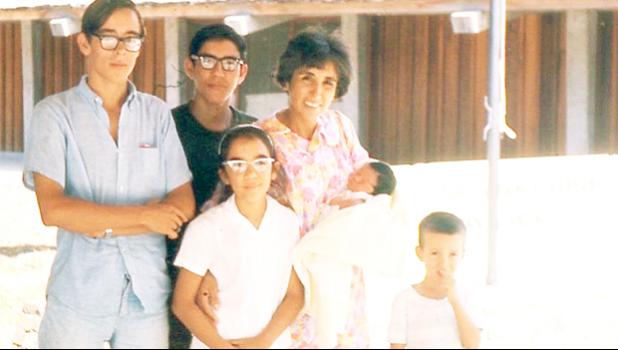 On July 10, 1968, Brian Cruz Conboy was born at the LBJ Tropical Medical Center. Brian is being held by his mother Josephine who moved to the territory with her husband Roy and their children after Roy received a contract job to work as principal for Nua Elementary School in 1966. Brian returned to his birthplace two weeks ago, 49 years after he left. See story for full details.  [photo: courtesy]