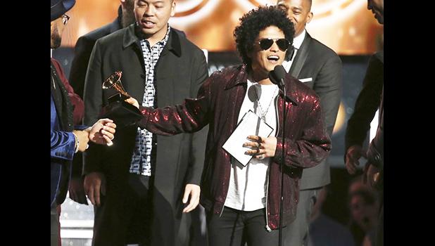 ts the award for song of the year for “That’s What I Like” at the 60th annual Grammy Awards at Madison Square Garden on Sunday, Jan. 28, 2018, in New York. (Photo by Matt Sayles/Invision/AP) ts the award for song of the year for “That’s What I Like” at the 60th annual Grammy Awards at Madison Square Garden on Sunday, Jan. 28, 2018, in New York. (Photo by Matt Sayles/Invision/AP)