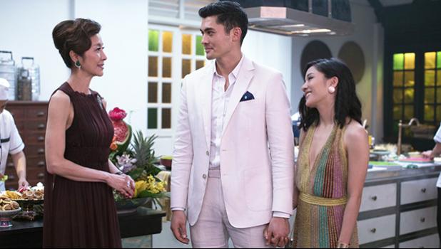 This image released by Warner Bros. Pictures shows, from left, Michelle Yeoh, Henry Golding and Constance Wu in a scene from “Crazy Rich Asians,” in theaters on August 17. (Sanja Bucko/Warner Bros. Pictures via AP)