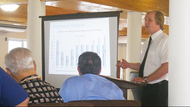 Commerce Department's newly recruited economist, Nathaniel ‘Nate’ Clayville speaking at last Thursday’s presentation by the ASG Revenue Task Force, during a briefing of lawmakers on upcoming proposed measures, which would hike some taxes, but repeal others as well as update the local tax code.  [photo: FS]
