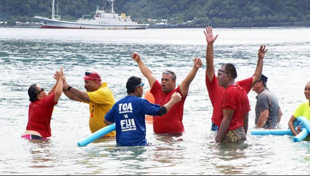 Swim Coach Zero Iaulualo praised athletes with special needs for finishing the swim meet and making it to the finish line. The first adaptive aquatic  swim meet was held last Saturday at Utulei Beach. [Photo: Ese Malala]