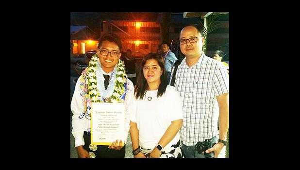 Proud parents Mr. and Mrs. Danny and Jenny DeLara with their son Hewlitt, one of the newly inducted members of Manumalo Academy's National Honor Society. [Photo: Blue Chen-Fruean]